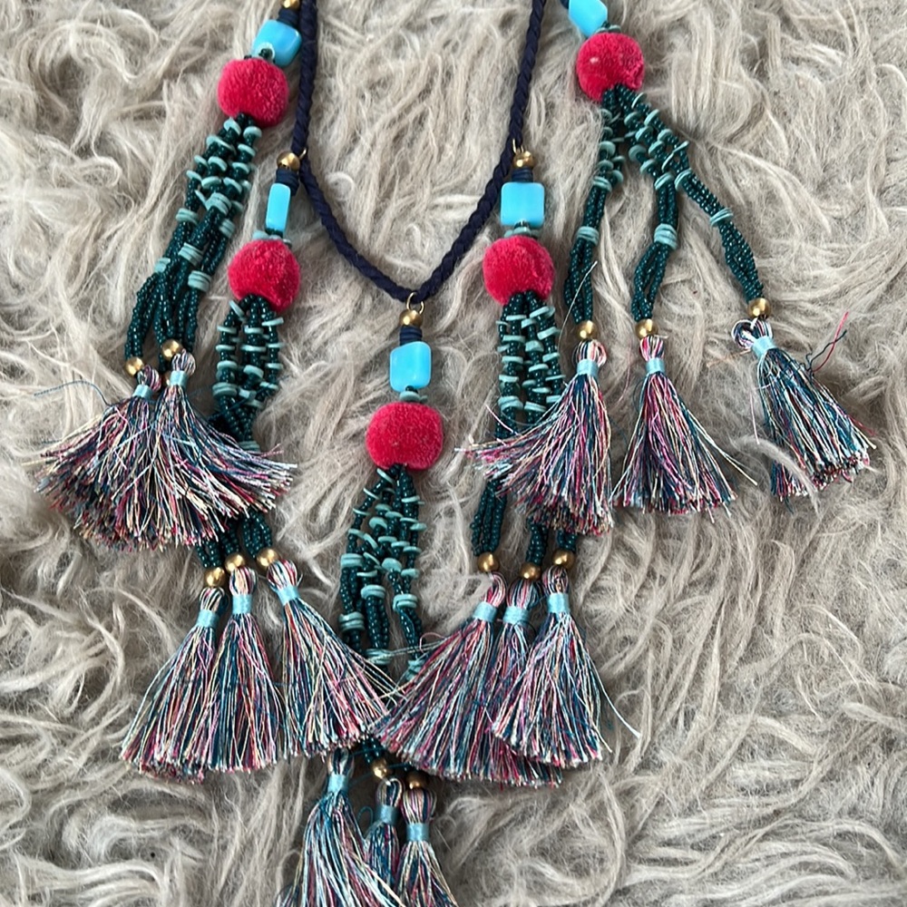 Noonday collection fair trade statement necklace with adjustable tie.